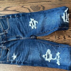 Distressed Blue Denim Jeans